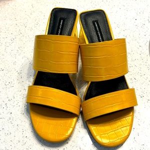 Healed sandals, leather, yellow and new. Never been worn.
